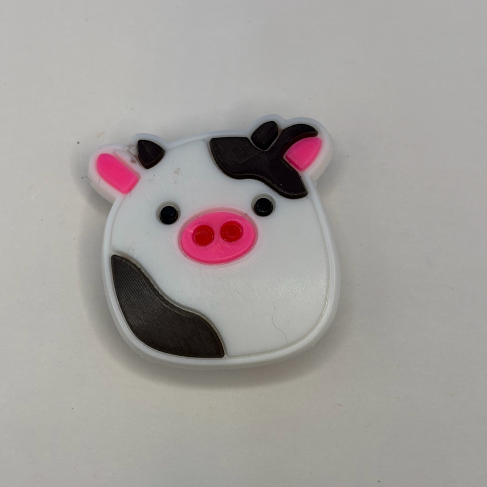 Connor The Cow Crocs Shoe Charm - White & Pink Cow-Patterned Design